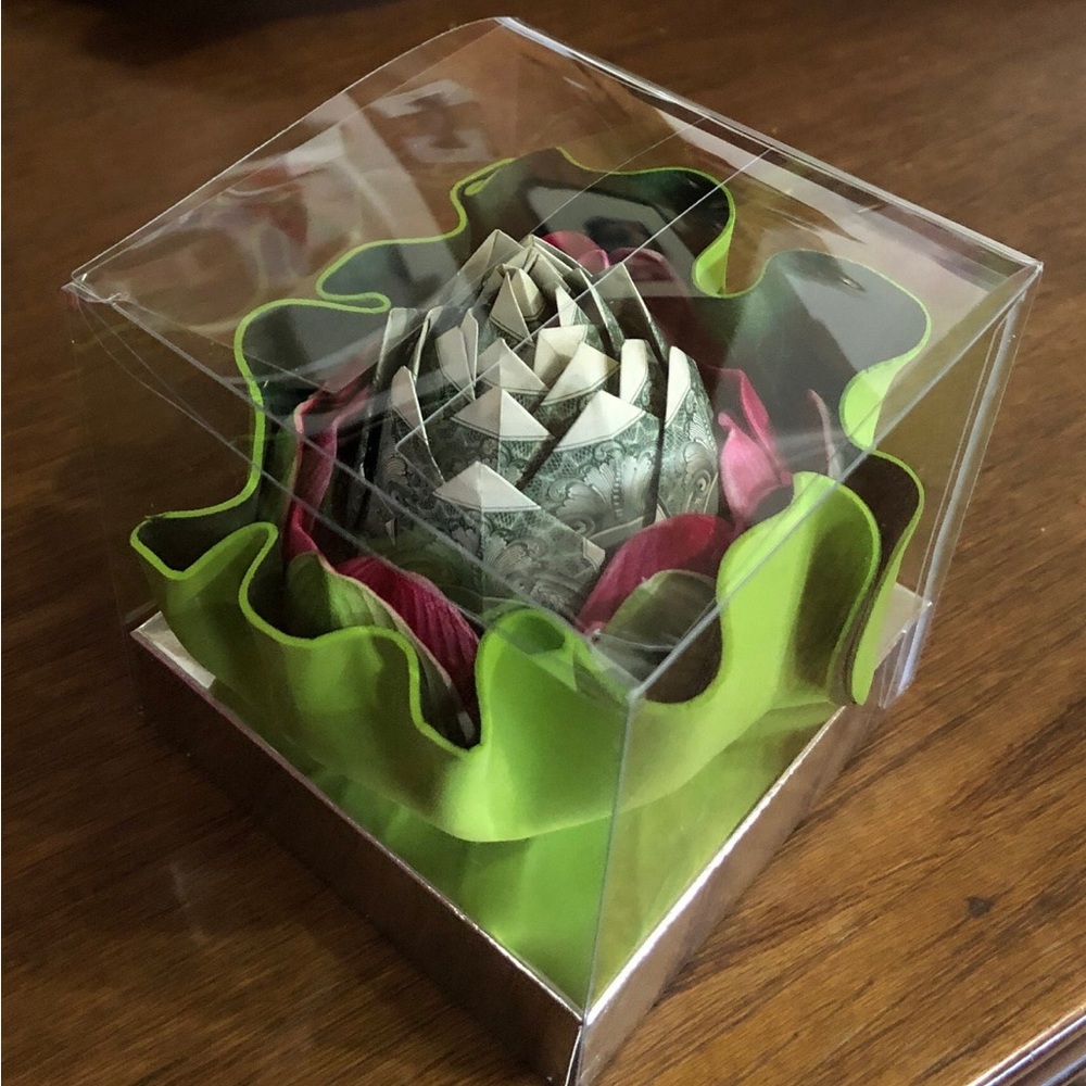 Lotus flower made of 12 one dollar bills